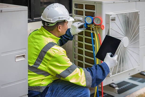 Professional Hvac technician working in Winfield, AL